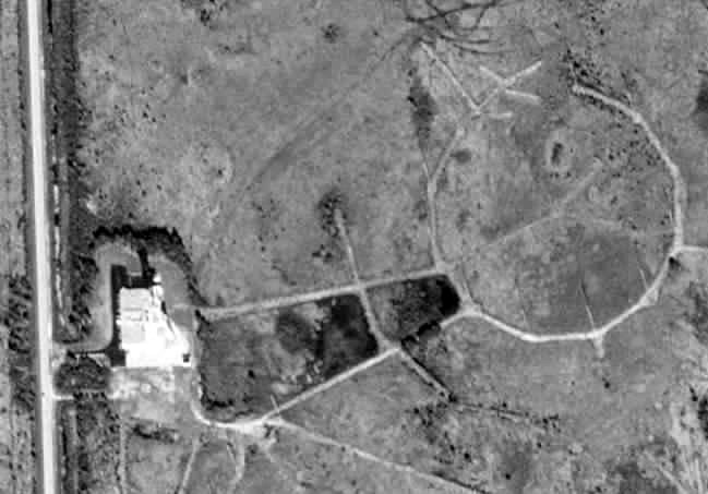 Aerial view showing building and antenna fields