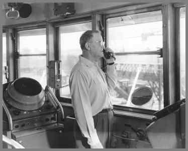Capt. of the John T. Hutchinson using the radio