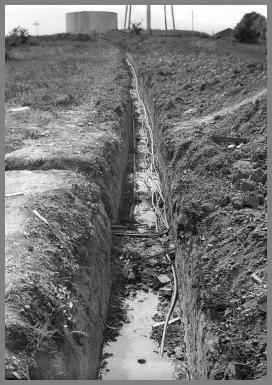 View of the power and comm. lines trench.