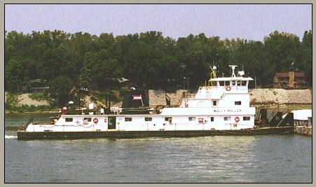 Photo of a towboat pushing a barge