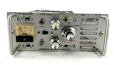 Small rack mount single channel receiver with 3 knobs, 5 switches, S meter,  and front mount speaker.