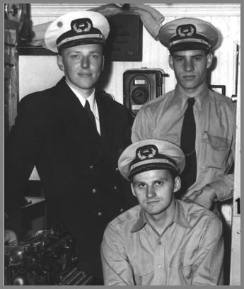 Three radio operators in uniform in the Radio Room of the SS South American
